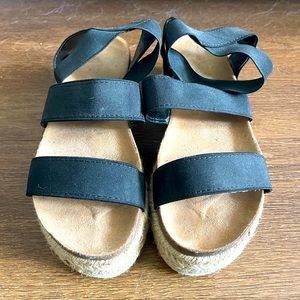 Black stretchy platform sandals